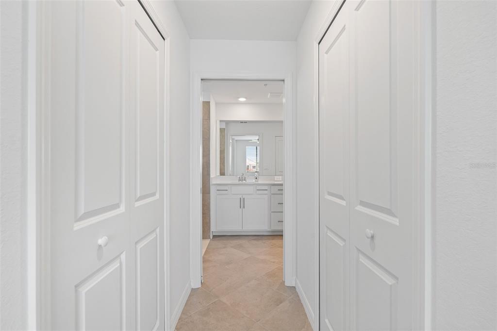 19007 Scallop Loop, Unit 108 Lakewood Ranch, FL 34211 - Photo 20 of 59 a view of a hallway with closet and entryway
