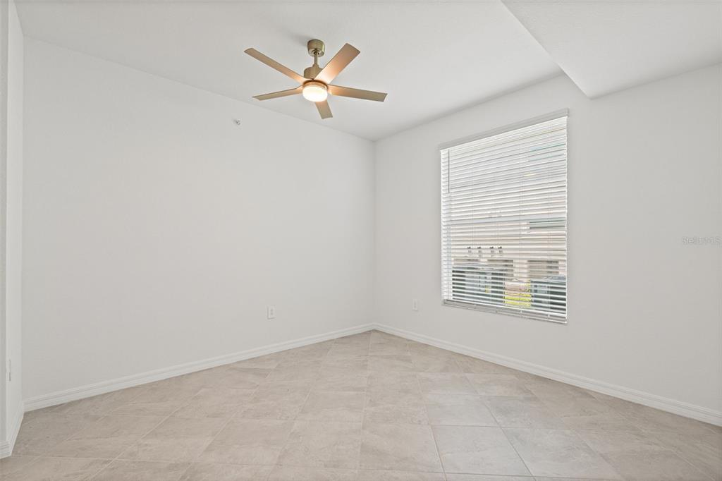 19007 Scallop Loop, Unit 108 Lakewood Ranch, FL 34211 - Photo 24 of 59 an empty room with a window