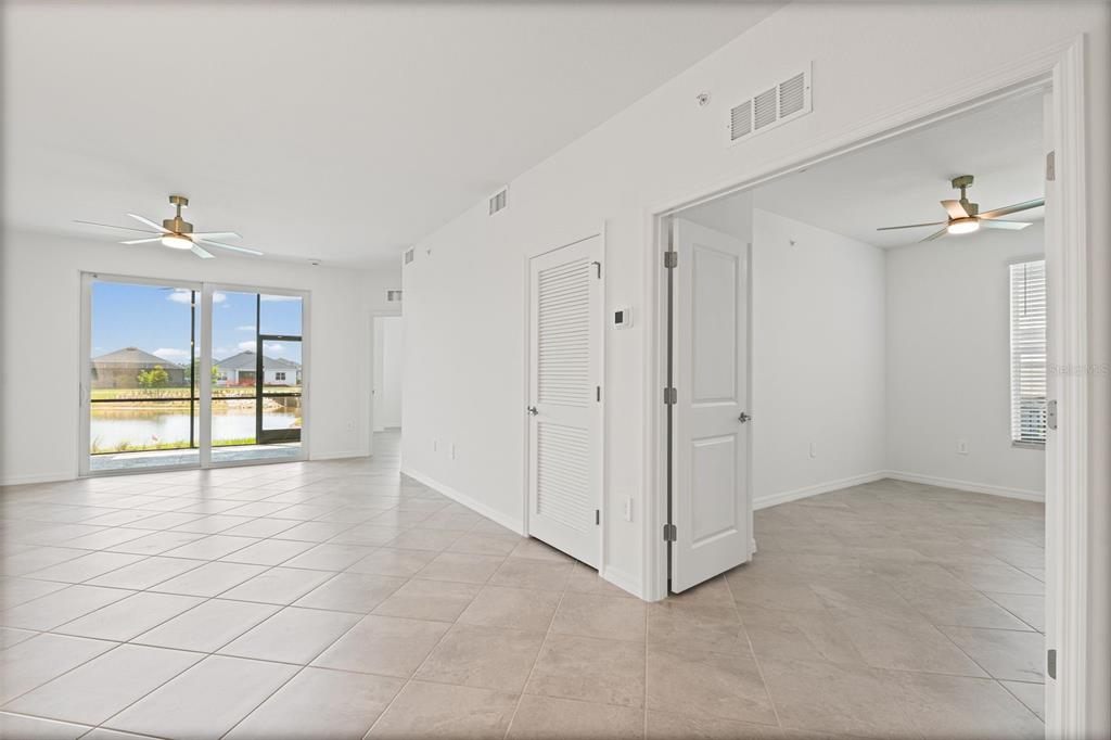 19007 Scallop Loop, Unit 108 Lakewood Ranch, FL 34211 - Photo 29 of 59 a view of an empty room with a window