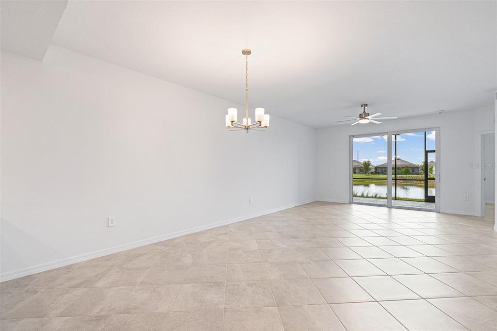19007 Scallop Loop, Unit 108 Lakewood Ranch, FL 34211 - Photo 30 of 59 a view of an empty room with a window