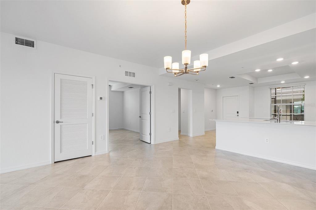 19007 Scallop Loop, Unit 108 Lakewood Ranch, FL 34211 - Photo 31 of 59 a view of an empty room and kitchen view