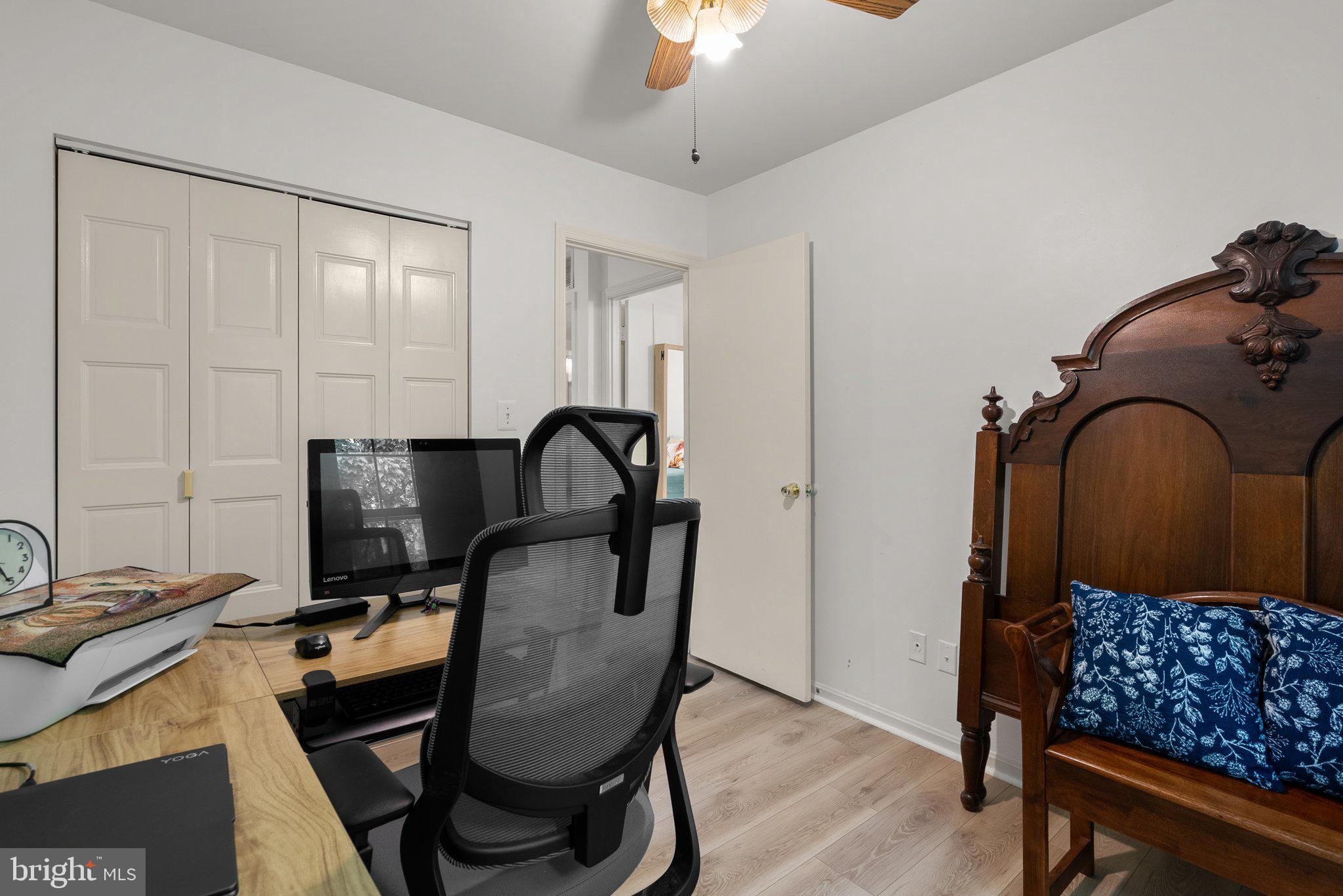 20249 Maple Leaf Court Montgomery Village, MD 20886 - Photo 18 of 30 a view of a workspace with furniture and a window