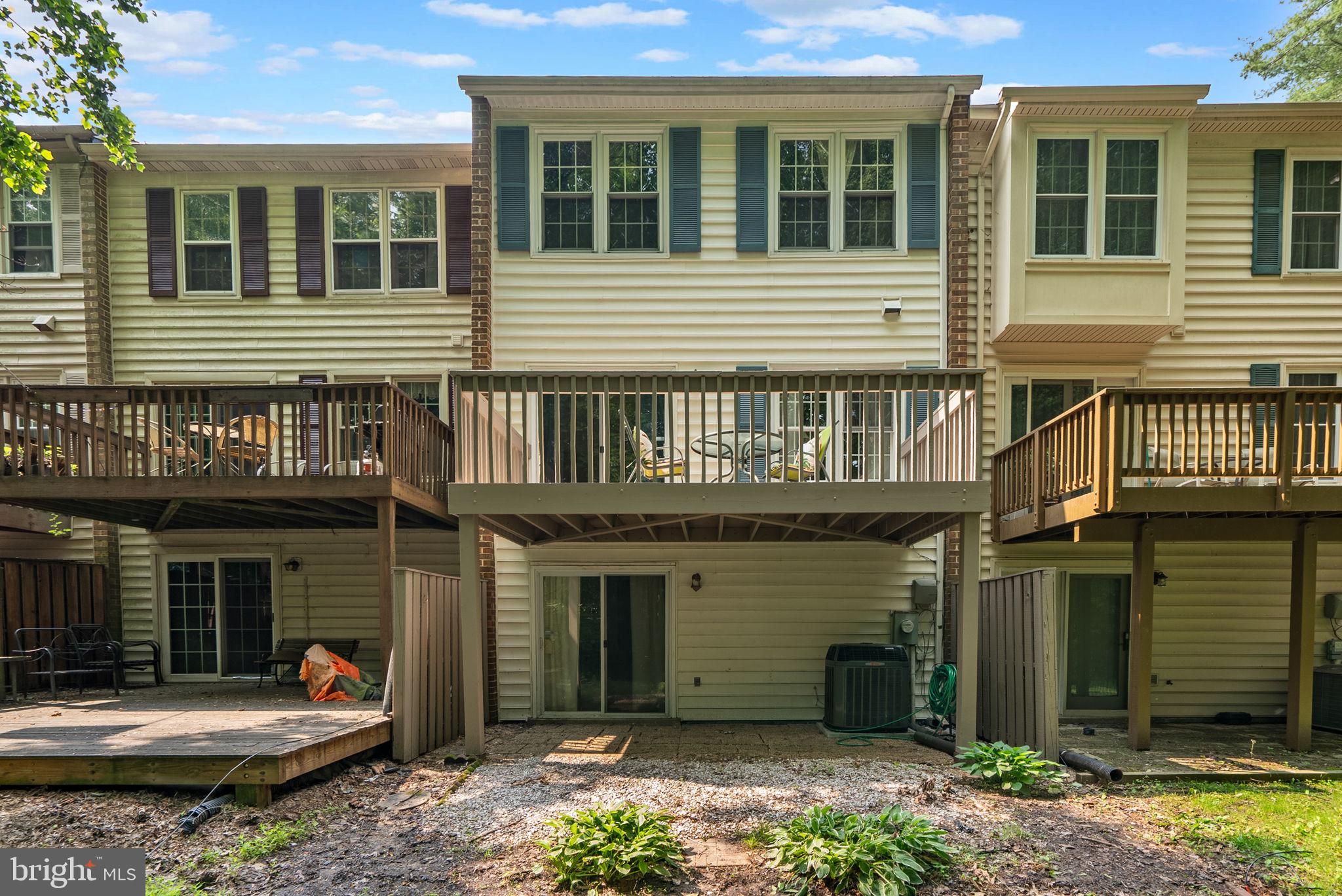 20249 Maple Leaf Court Montgomery Village, MD 20886 - Photo 29 of 30 a front view of a house with a yard