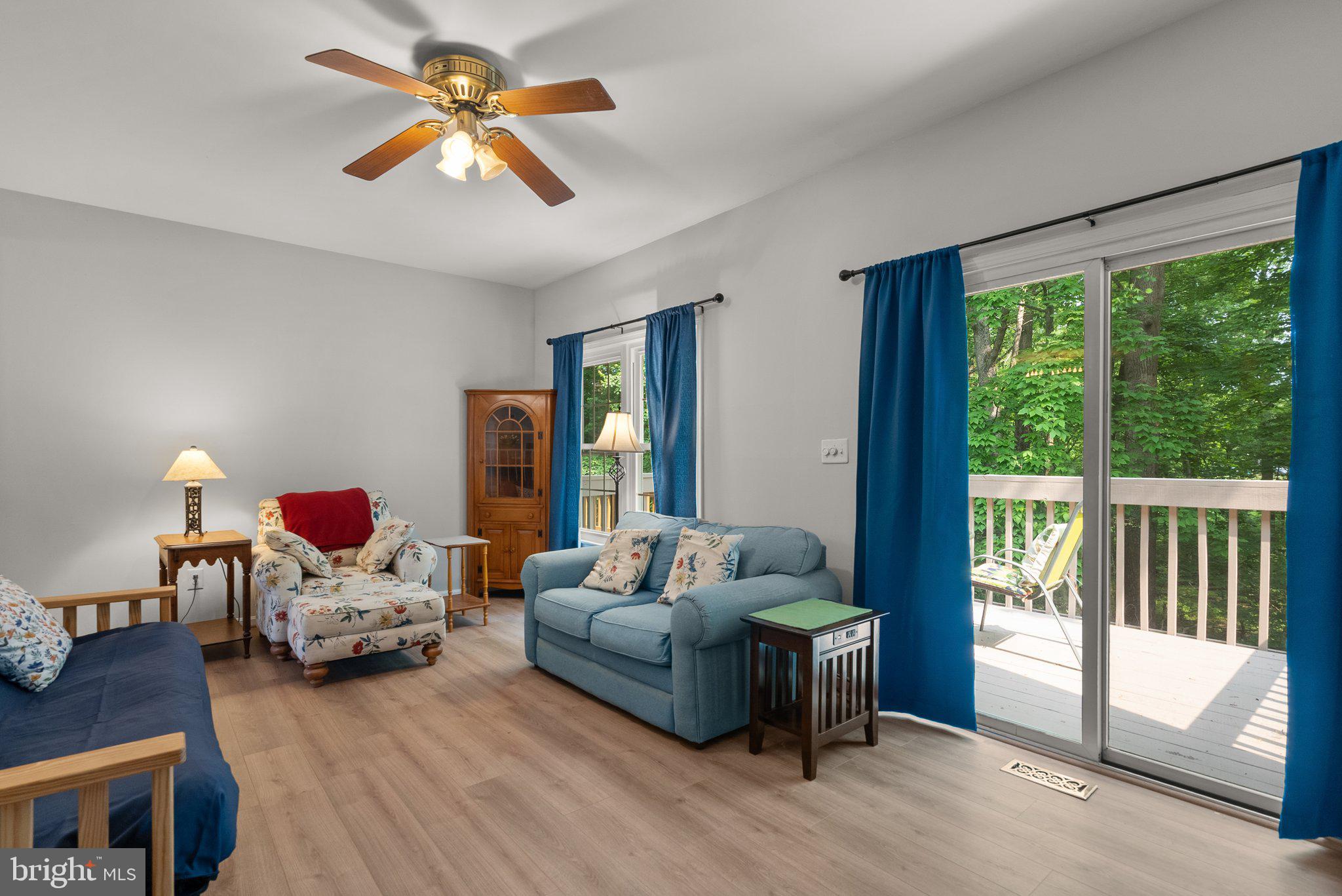 20249 Maple Leaf Court Montgomery Village, MD 20886 - Photo 3 of 30 a living room with furniture and a large window