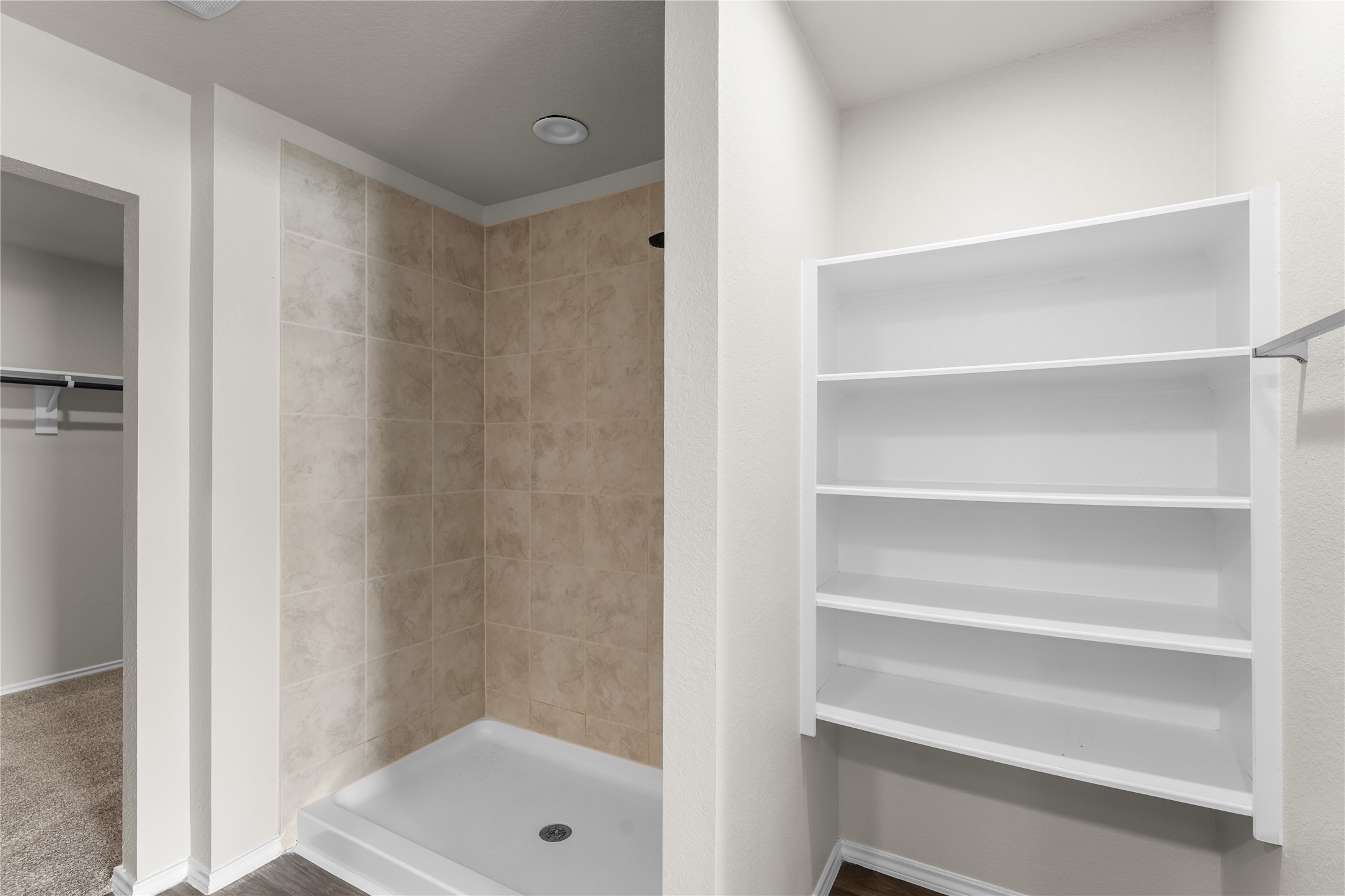 5214 Perkins Ridge Way Katy, TX 77449 - Photo 18 of 29 Large walk-in shower and storage shelf