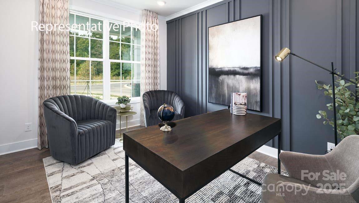 3044 Canvasback Way Indian Trail, NC 28079 - Photo 11 of 43 a living room with furniture and a large window