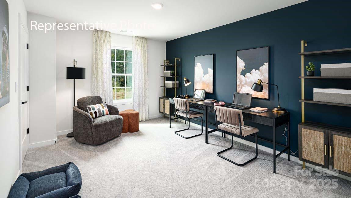 3044 Canvasback Way Indian Trail, NC 28079 - Photo 31 of 43 a living room with furniture and a window