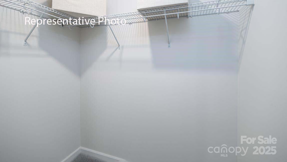 3044 Canvasback Way Indian Trail, NC 28079 - Photo 33 of 43 a view of a room with racks on the wall