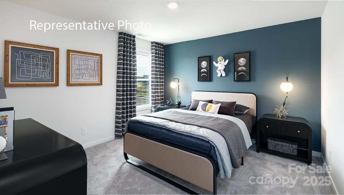 3044 Canvasback Way Indian Trail, NC 28079 - Photo 34 of 43 a bedroom with a bed and a desk