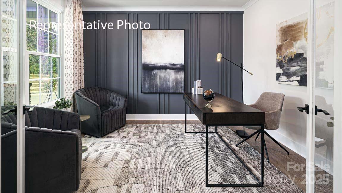 3044 Canvasback Way Indian Trail, NC 28079 - Photo 10 of 43 a living room with furniture and a window