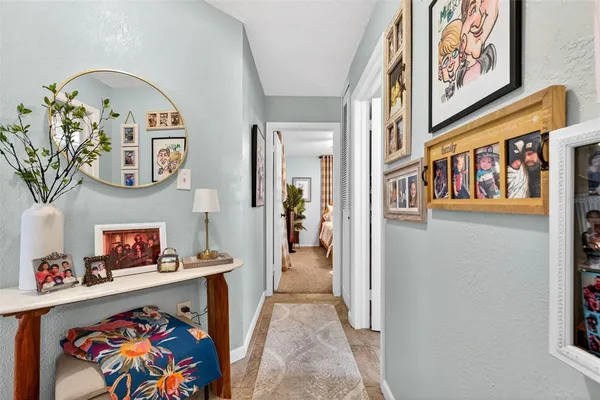 a view of an entryway with wooden floor