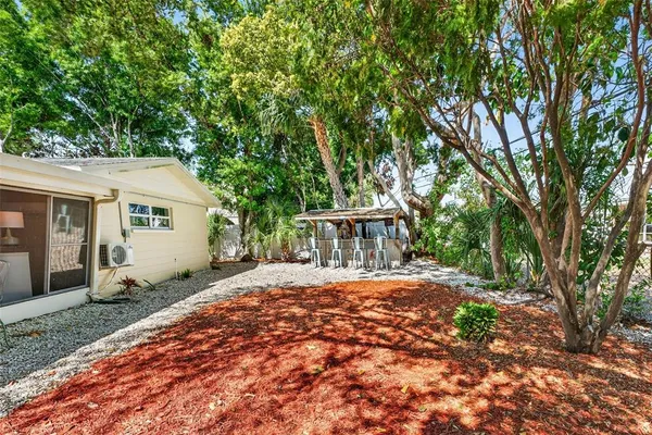 a view of a yard in front of a house