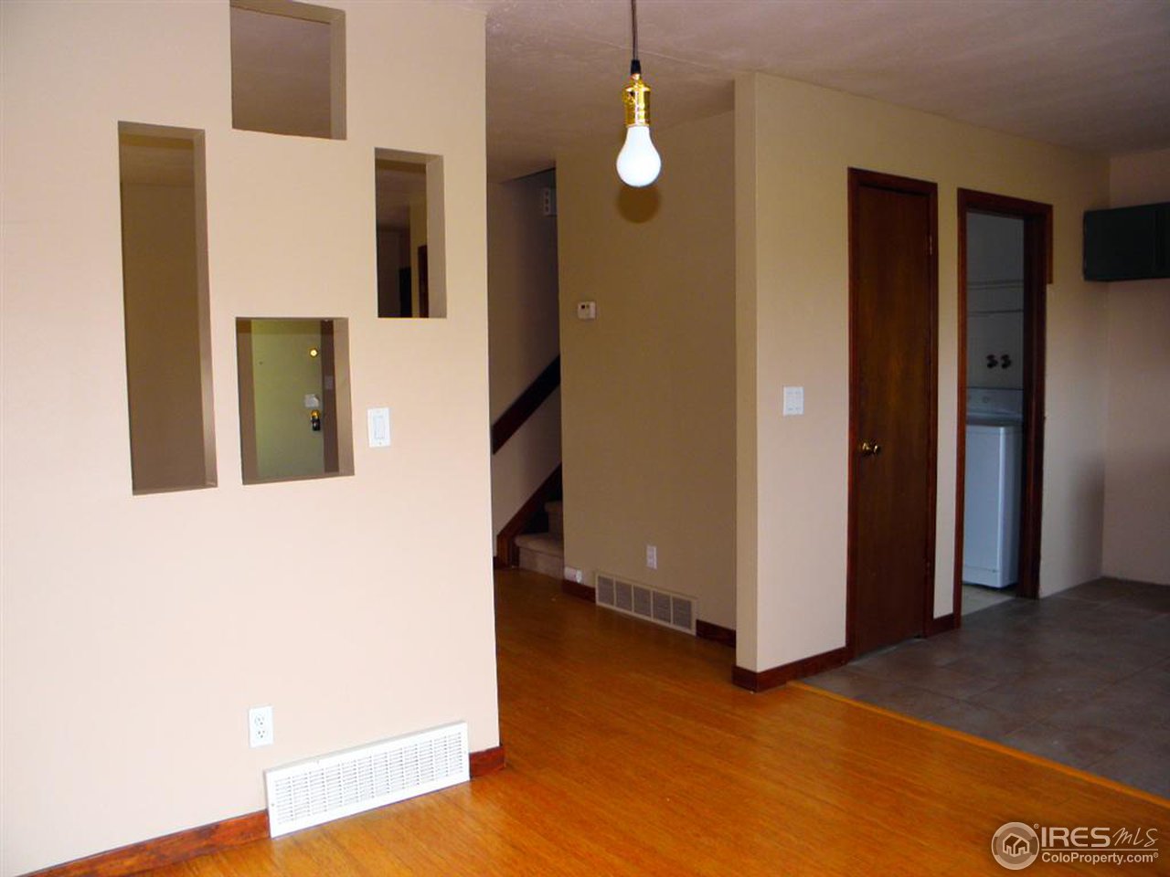 6628 Kalua Road Boulder, CO 80301 - Photo 4 of 13 a view of a livingroom with wooden floor