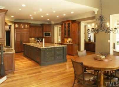 Australian wormy chestnut floors throughout kitchen, family room, hearth room and breakfast nook Other