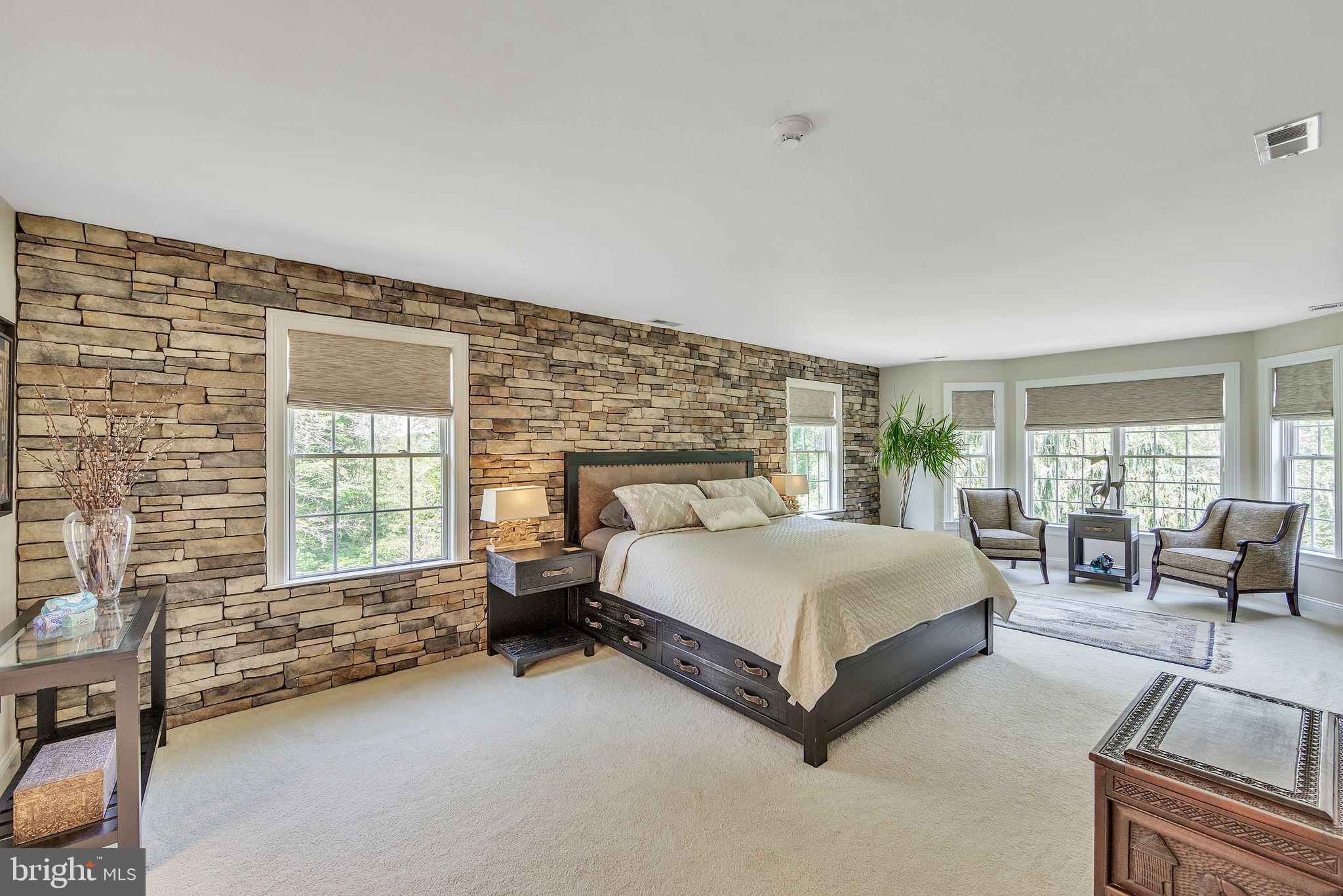 1303 Lenape Road West Chester, PA 19382 - Photo 39 of 94 Primary Bedroom Suite with Stone Wall