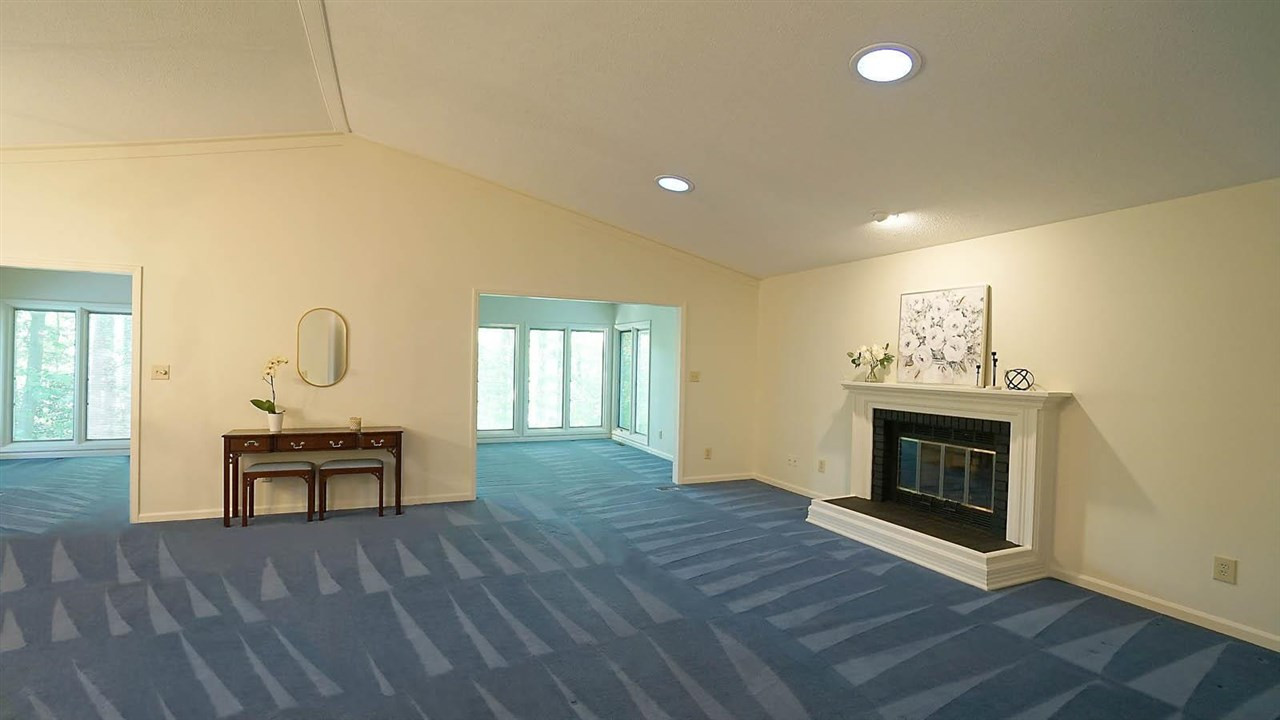 2801 Rue Sans Famille Raleigh, NC 27607 - Photo 25 of 26 Foyer view into living/dining/sunroom. Lots of space to create many room configurations Open Floor Plan