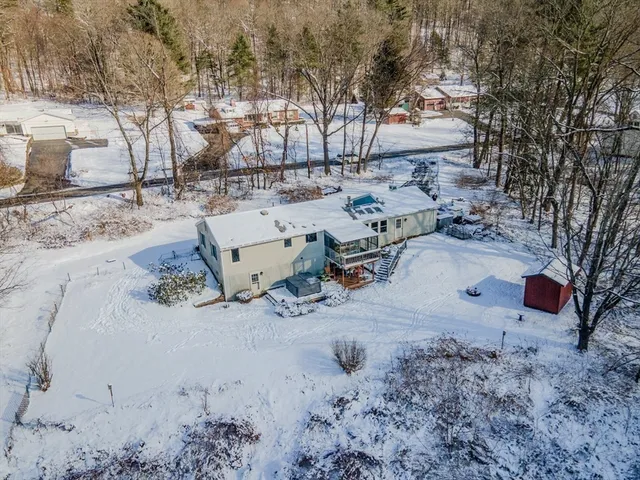a view of a yard covered with snow