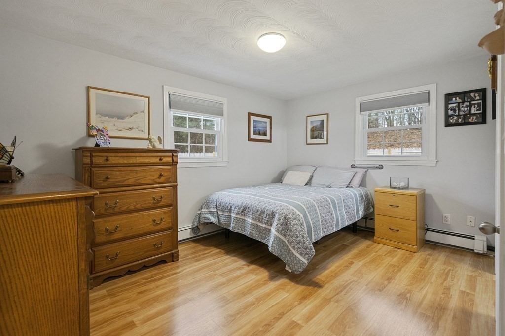 26 Edith Road Framingham, MA 01701 - Photo 25 of 42 a bedroom with a bed and furniture