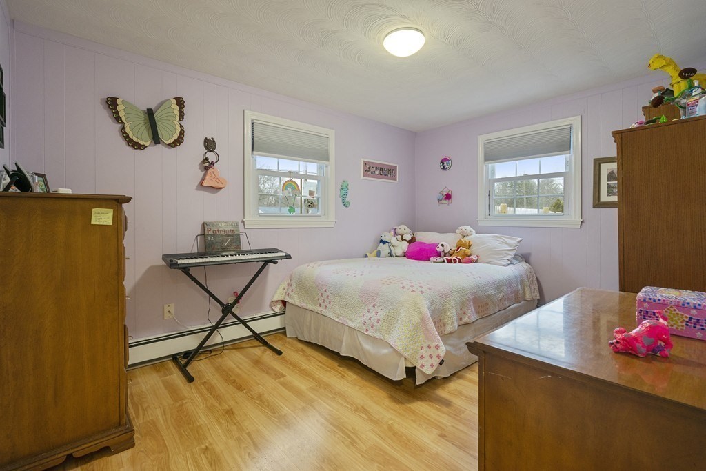 26 Edith Road Framingham, MA 01701 - Photo 26 of 42 a bedroom with a bed and window