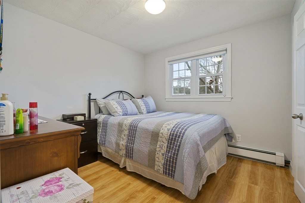 26 Edith Road Framingham, MA 01701 - Photo 28 of 42 a bedroom with a bed and window