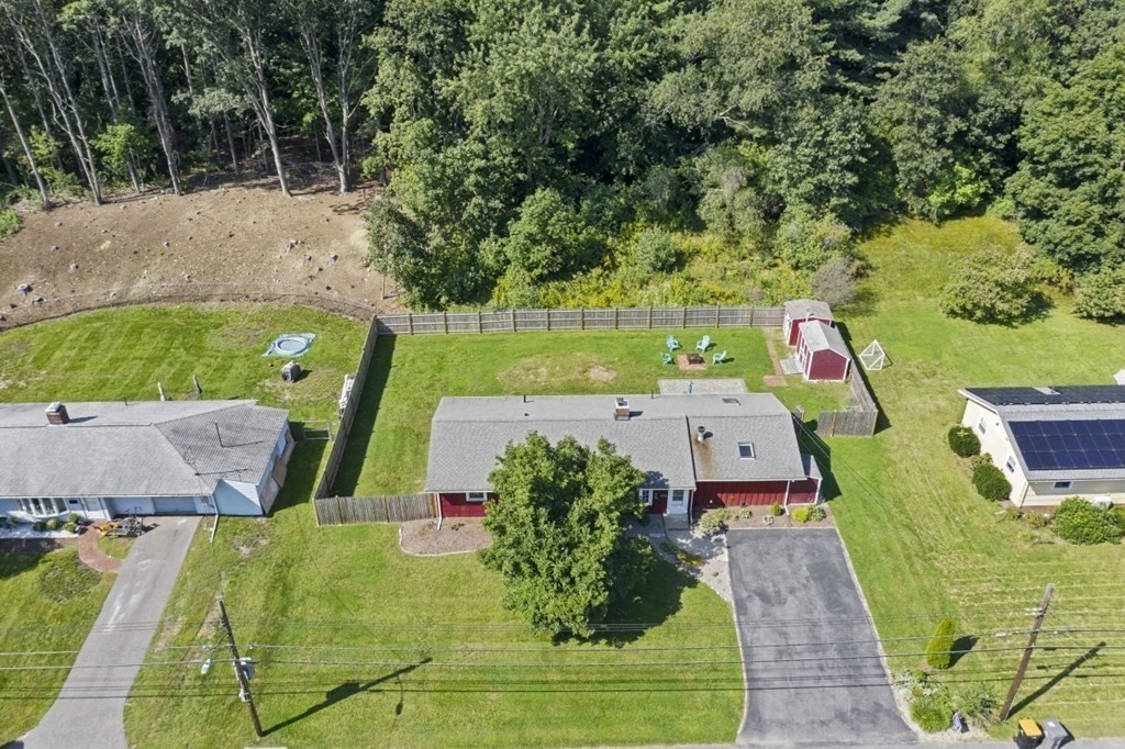 26 Edith Road Framingham, MA 01701 - Photo 39 of 42 an aerial view of a house with a swimming pool