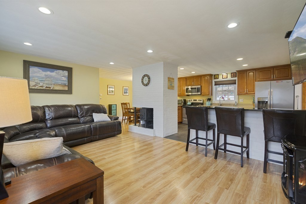 26 Edith Road Framingham, MA 01701 - Photo 5 of 42 a living room with furniture and kitchen view