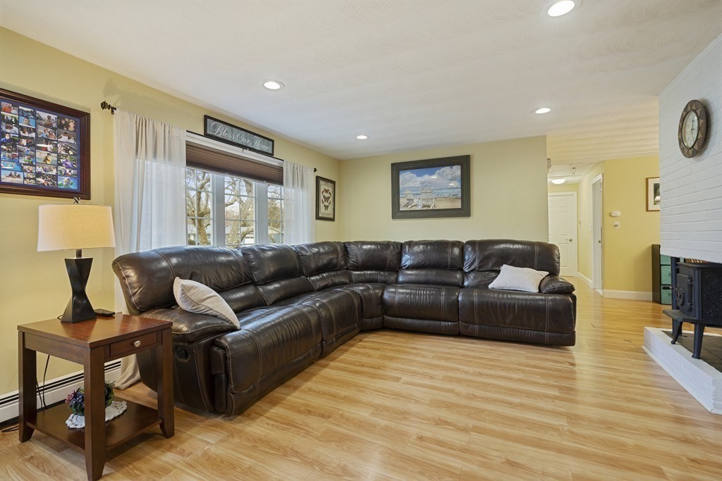 26 Edith Road Framingham, MA 01701 - Photo 6 of 42 a living room with furniture and a wooden floor