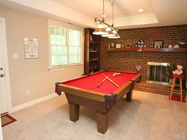 5024 Trail Ridge Drive Raleigh, NC 27613 - Photo 20 of 25 Basement has a wonderful rec. room w/fireplace. Room for pool table & fun family games Basement