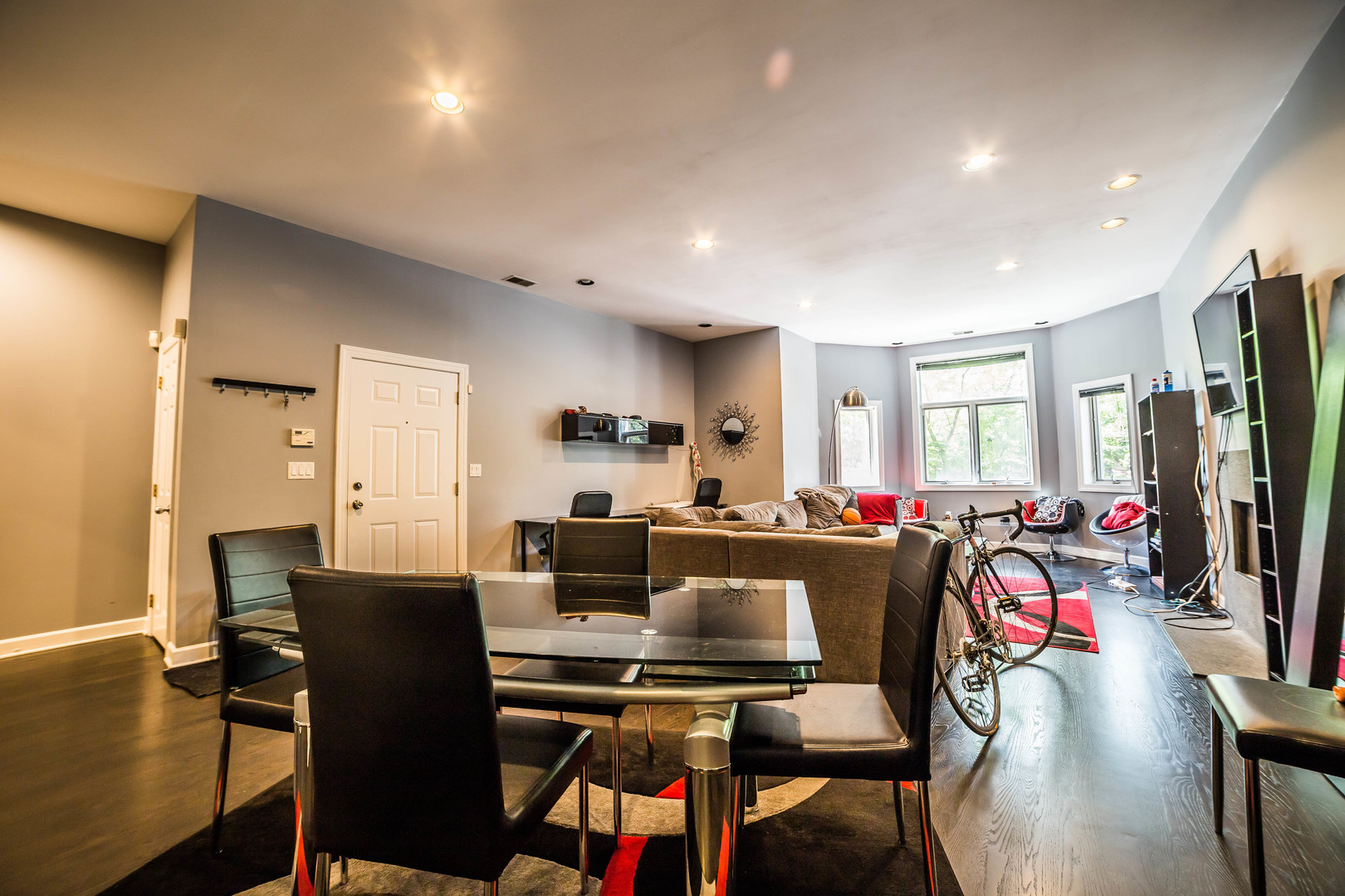 2629 North Ashland Avenue, Unit 2A Chicago, IL 60614 - Photo 5 of 19 a view of a dining room with furniture a rug and wooden floor