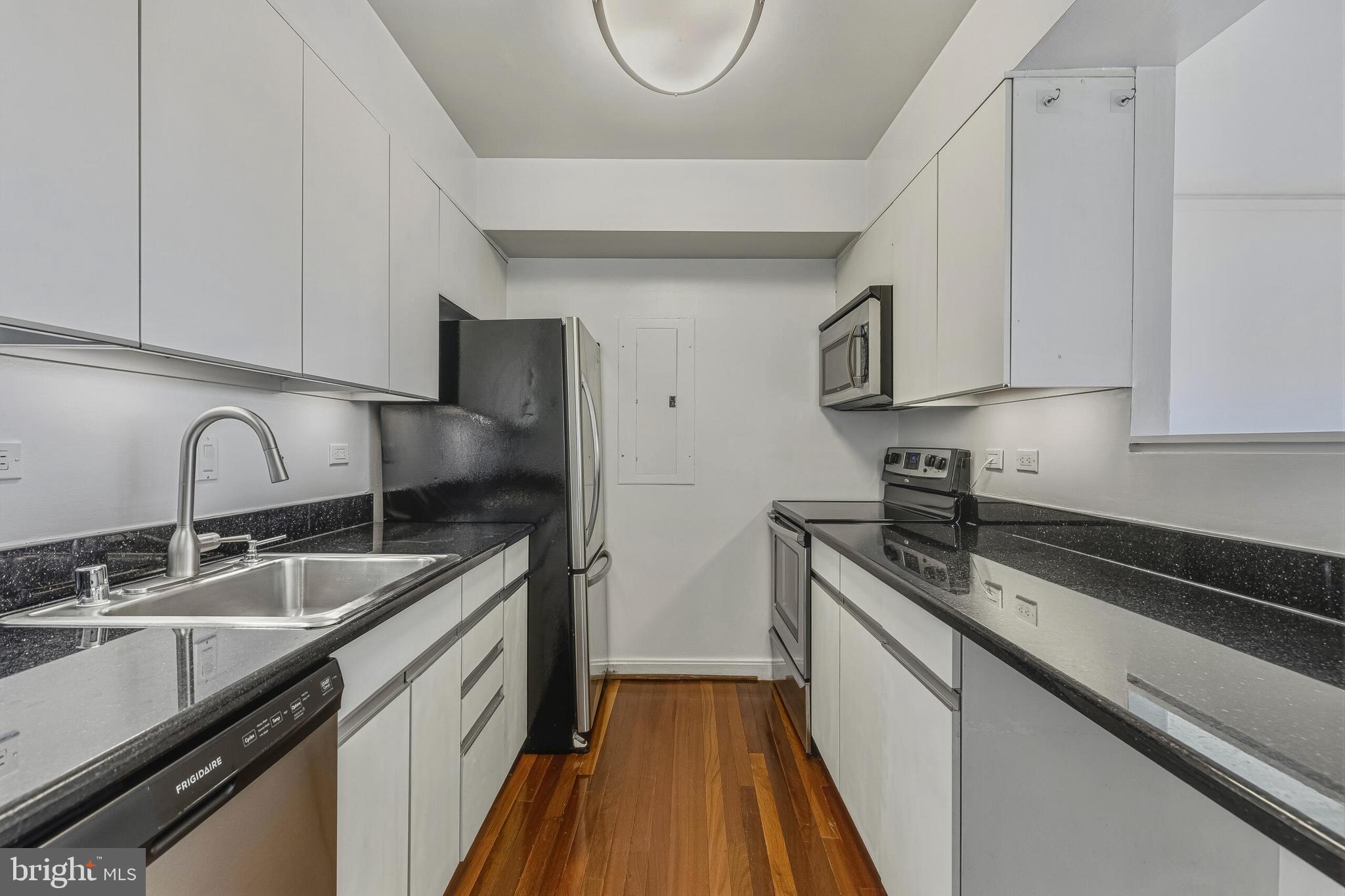 2501 M Street Northwest, Unit 722 Washington, DC 20037 - Photo 6 of 26 Kitchen Off the Living Room - SS Appliances