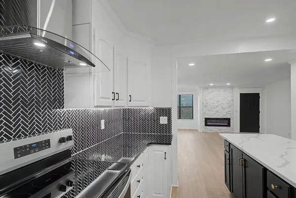 a kitchen with a sink and cabinets