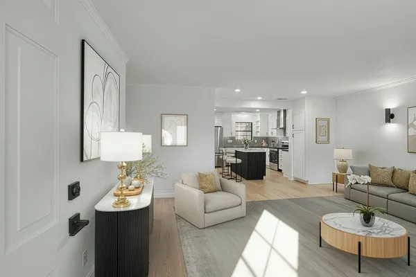 a living room with furniture and a lamp