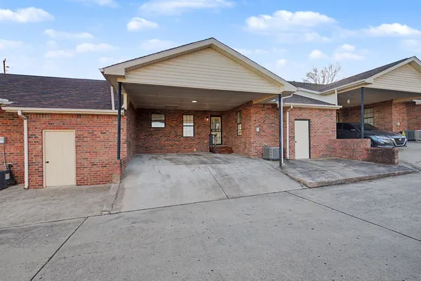 a view of a house with a garage