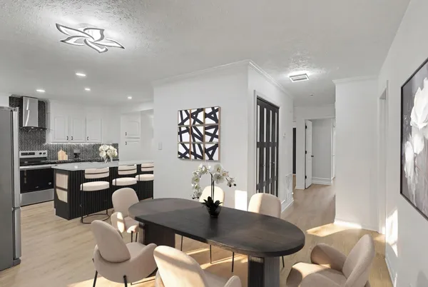 a dining room with furniture and window