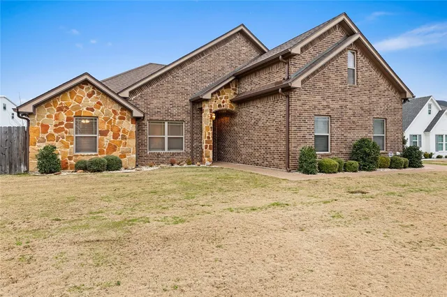 a view of swimming pool with a yard