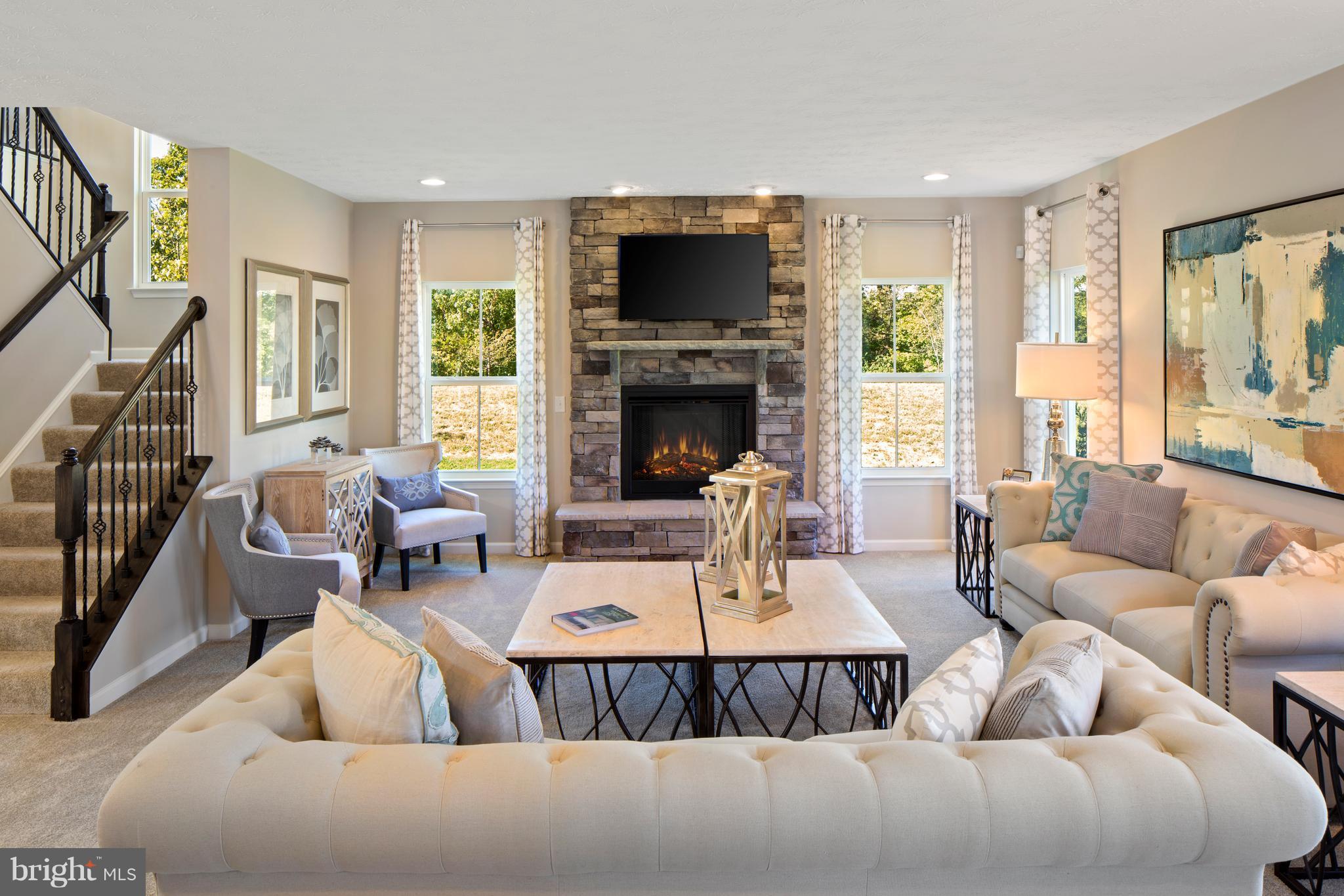 3118 Roderick Road Frederick, MD 21704 - Photo 3 of 25 a living room with fireplace furniture and a large window