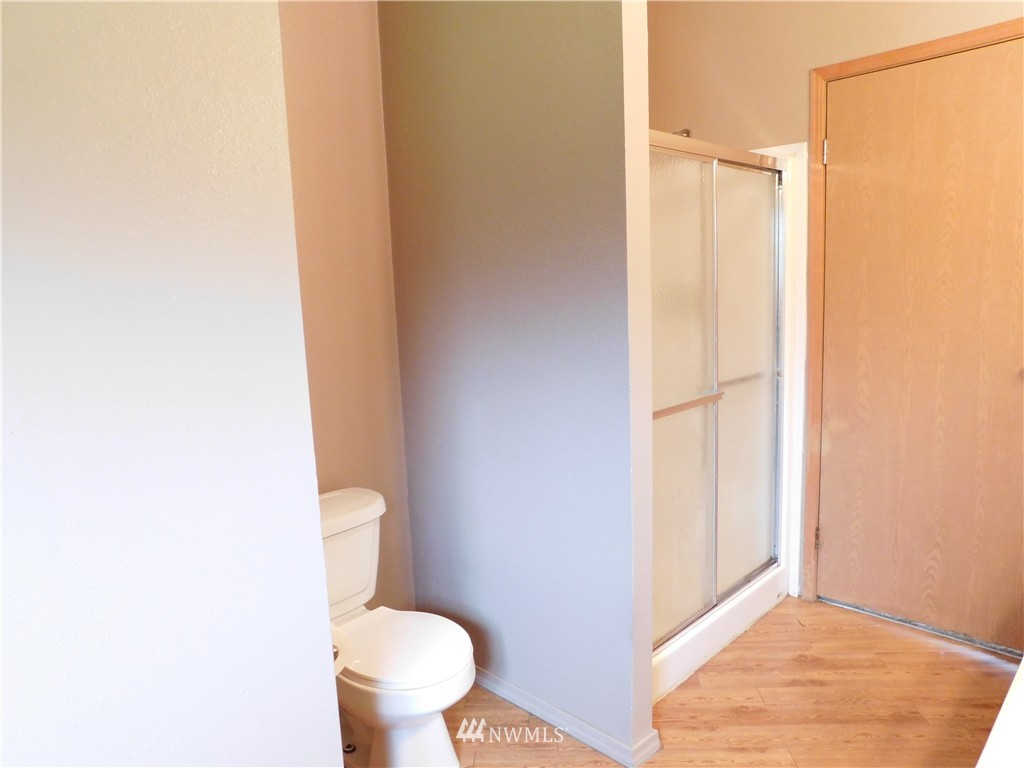 18022 Lawton Lane Southwest Rochester, WA 98579 - Photo 19 of 25 a bathroom with a toilet