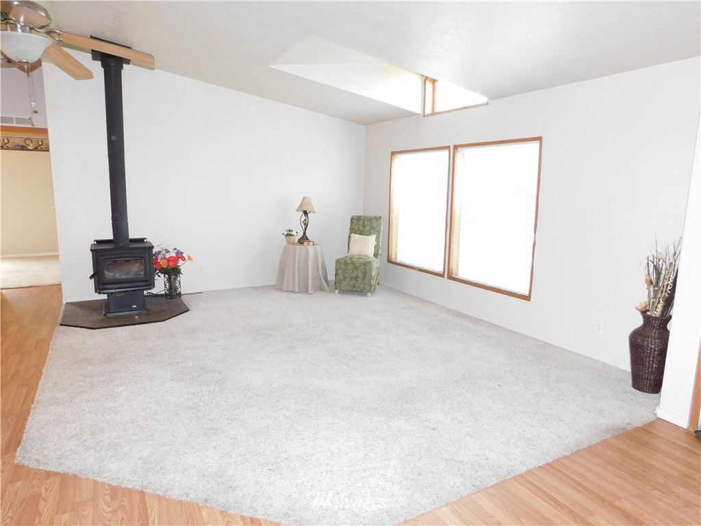 18022 Lawton Lane Southwest Rochester, WA 98579 - Photo 8 of 25 a view of livingroom with furniture and floor to ceiling window