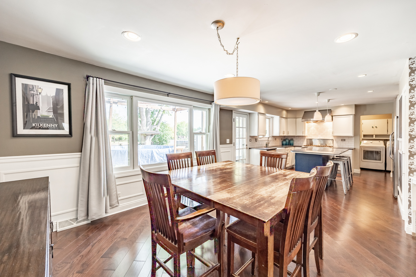 1223 Ridgeway Drive Elgin, IL 60123 - Photo 11 of 40 a view of a dining room with furniture window and wooden floor
