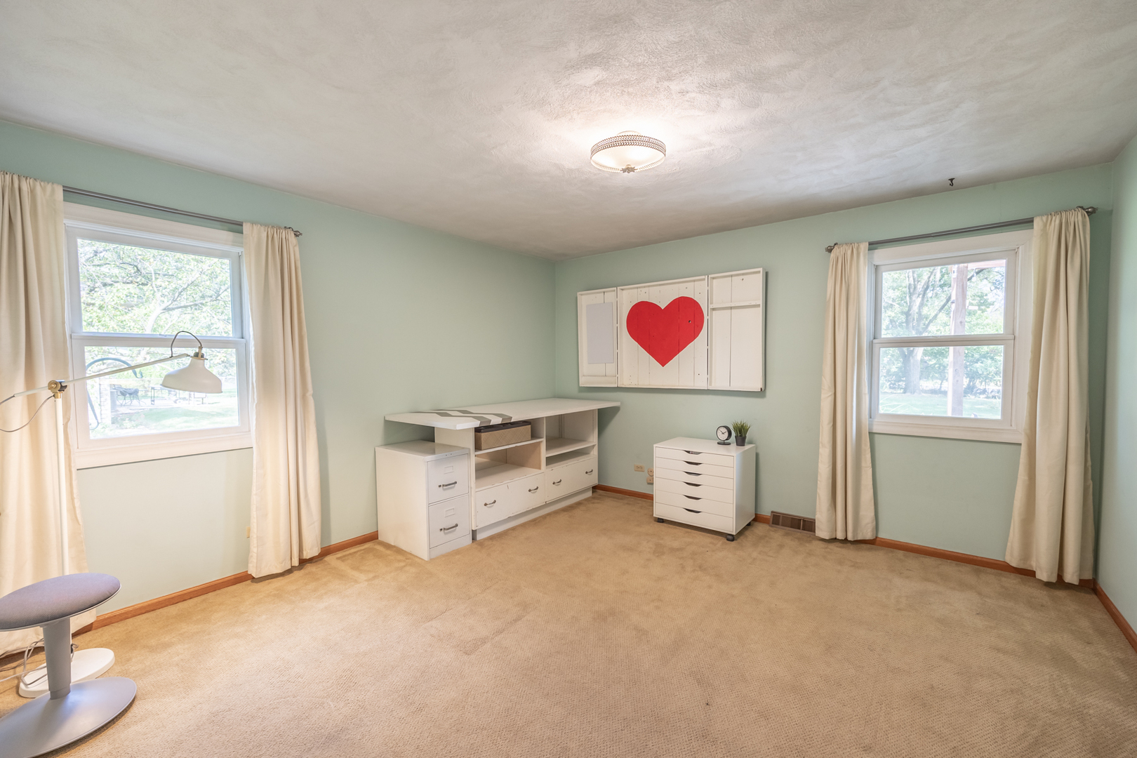 1223 Ridgeway Drive Elgin, IL 60123 - Photo 18 of 40 a room with furniture and windows