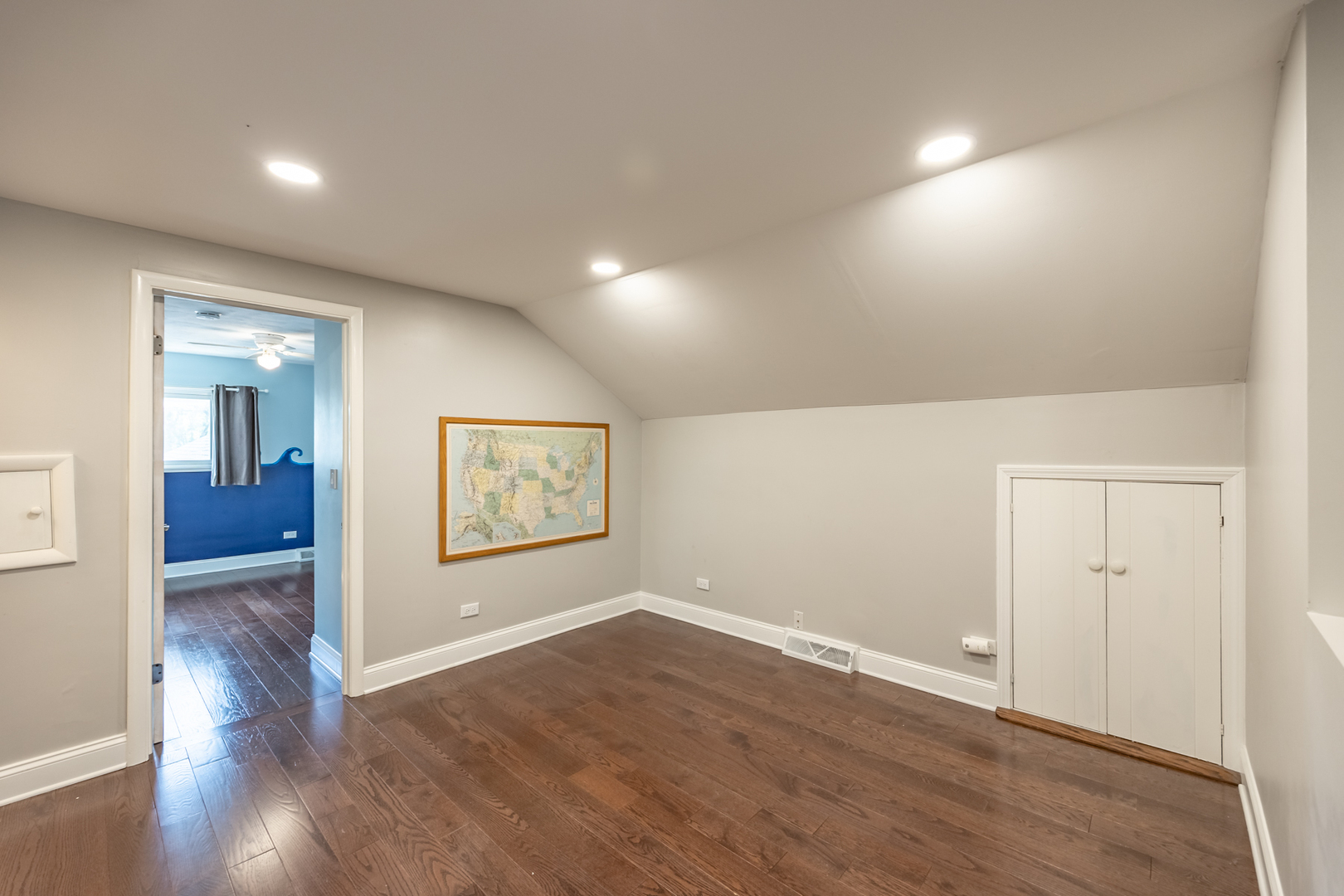1223 Ridgeway Drive Elgin, IL 60123 - Photo 26 of 40 an empty room with wooden floor and windows