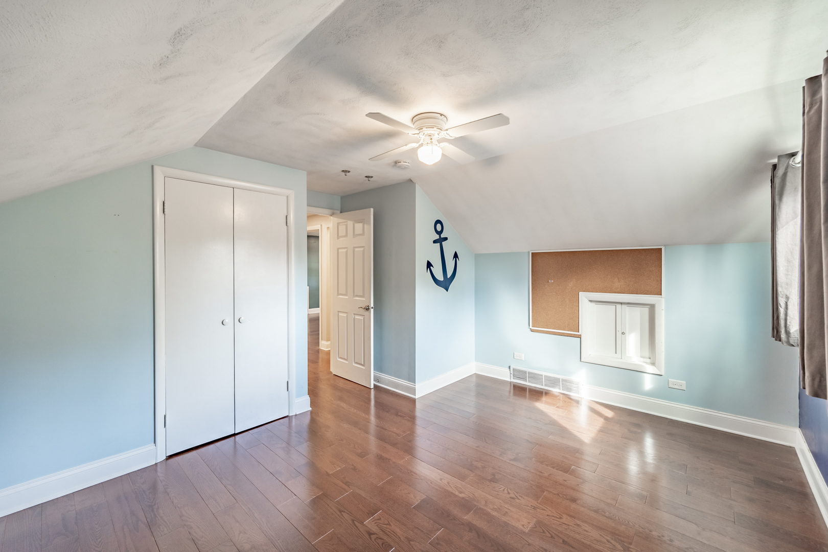 1223 Ridgeway Drive Elgin, IL 60123 - Photo 28 of 40 wooden floor in an empty room with a window