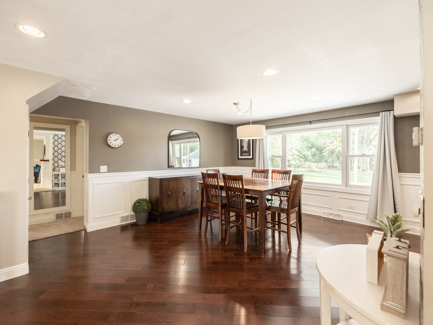 1223 Ridgeway Drive Elgin, IL 60123 - Photo 8 of 40 a view of a dining room with furniture window and wooden floor