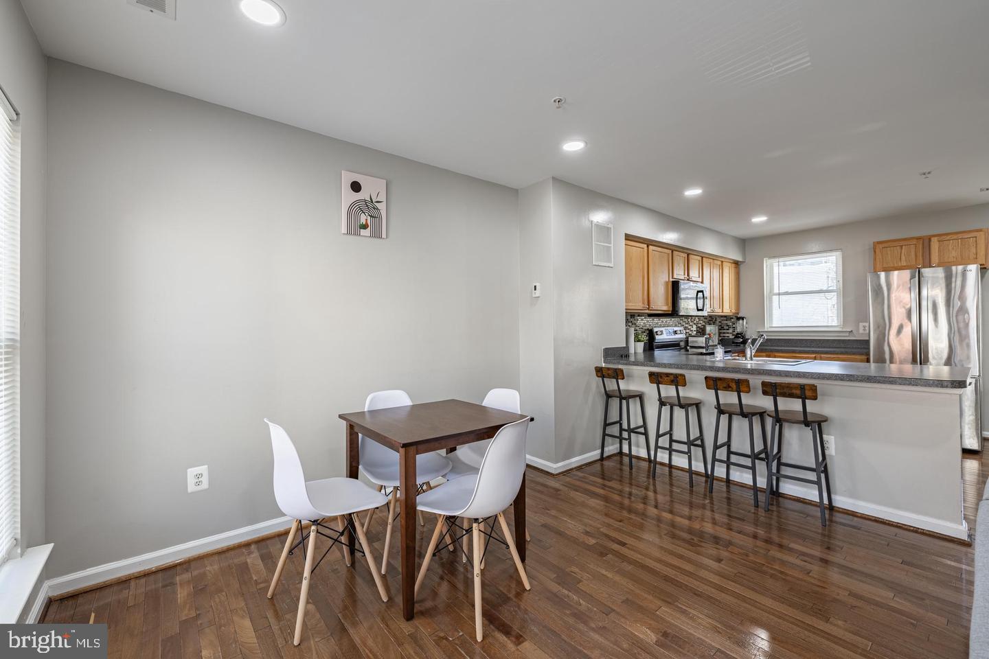 1021 3rd Place Southeast Washington, DC 20003 - Photo 12 of 29 a view of a dining room with furniture and wooden floor