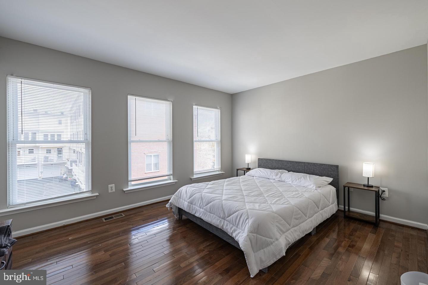 1021 3rd Place Southeast Washington, DC 20003 - Photo 24 of 29 a bedroom with a bed and window