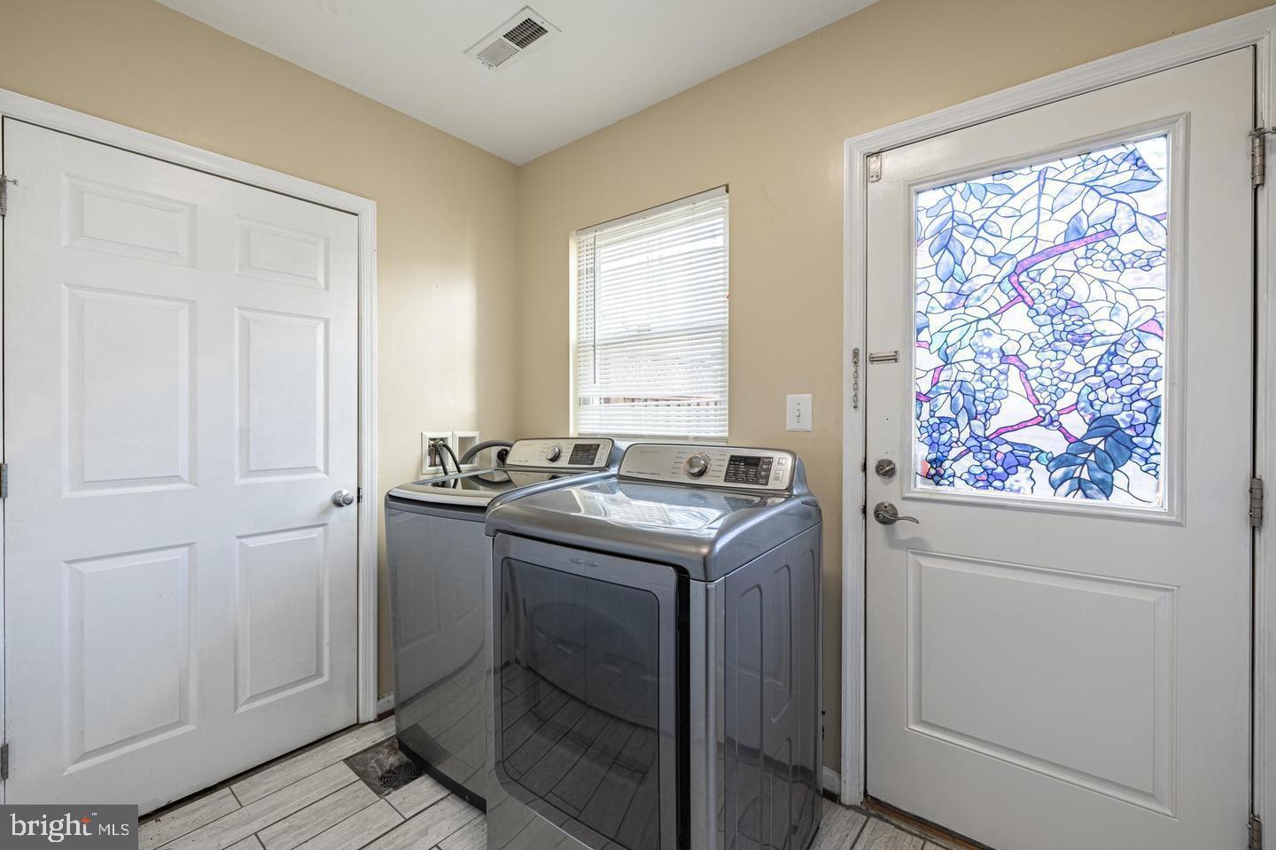 1021 3rd Place Southeast Washington, DC 20003 - Photo 5 of 29 a view of utility room with washer and dryer