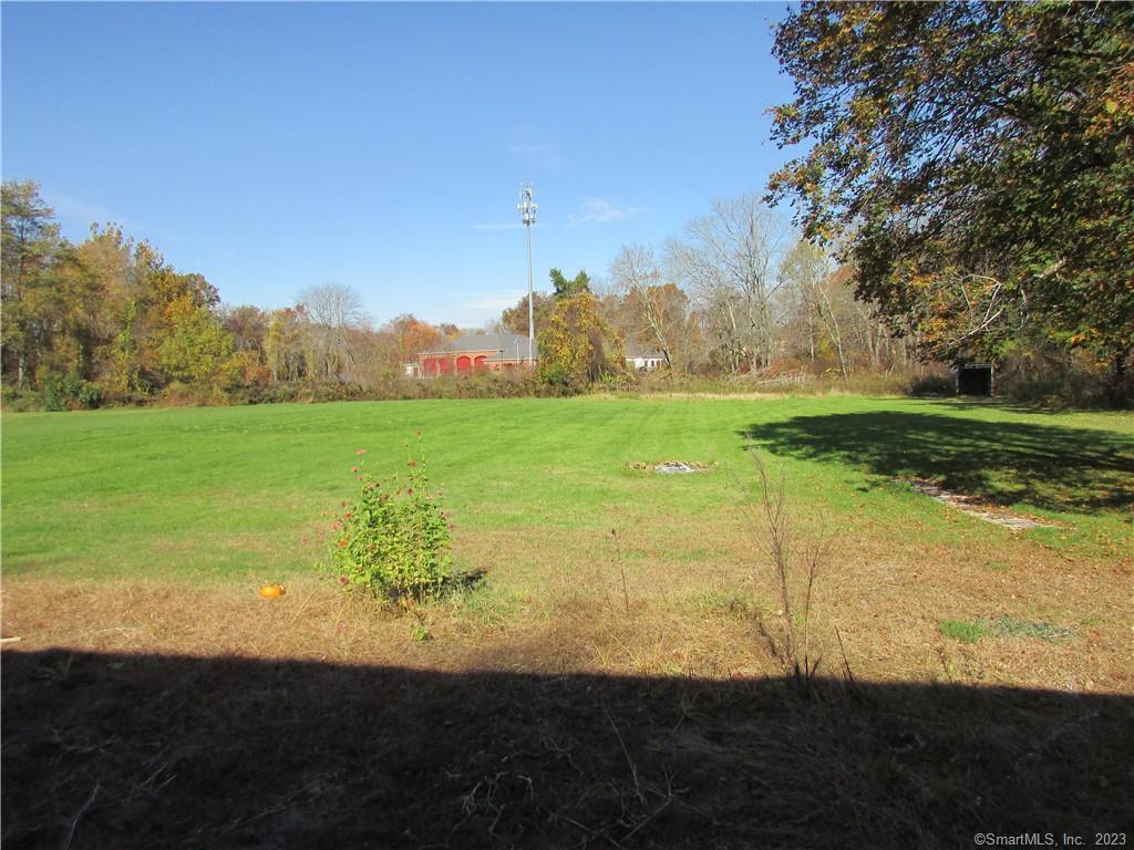 235 Shaker Road Enfield, CT 06082 - Photo 14 of 15 a view of a lake with a yard