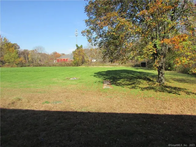 a view of an ocean and a yard