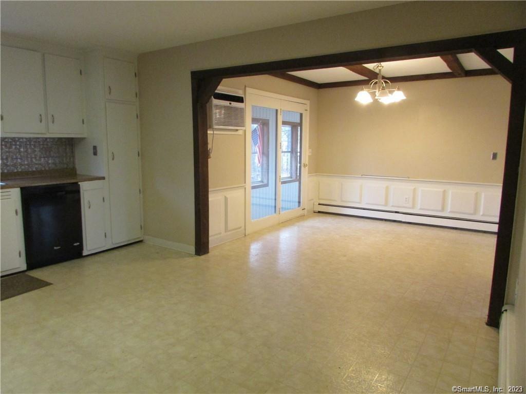 235 Shaker Road Enfield, CT 06082 - Photo 6 of 15 a view of an empty room with a fireplace