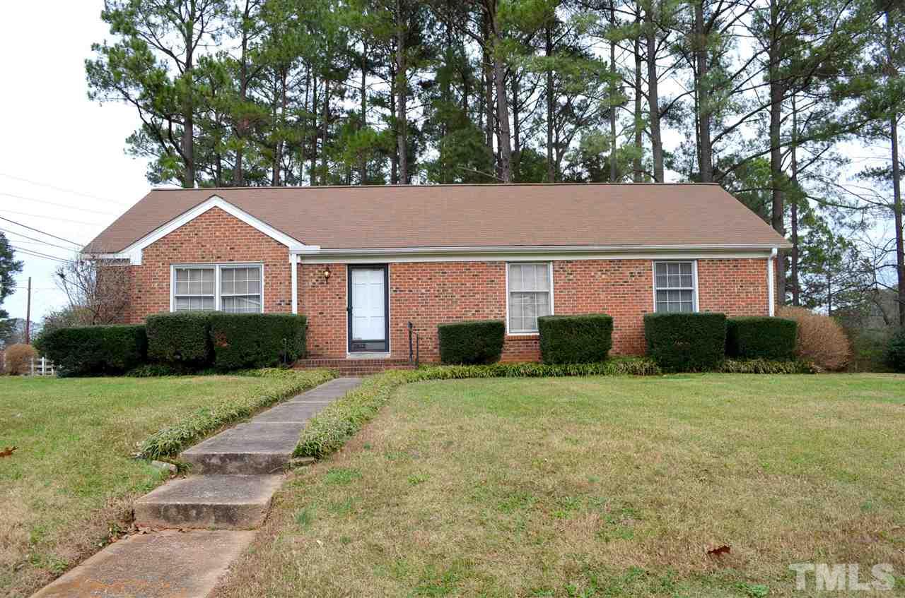3001 Morningside Drive Raleigh, NC 27607 - Photo 2 of 16 a front view of a house with a garden